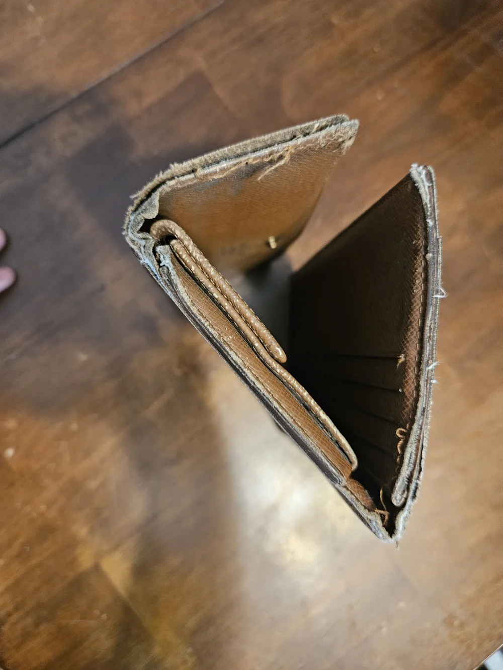 Louis Vuitton Monogram Continental Wallet in Brown